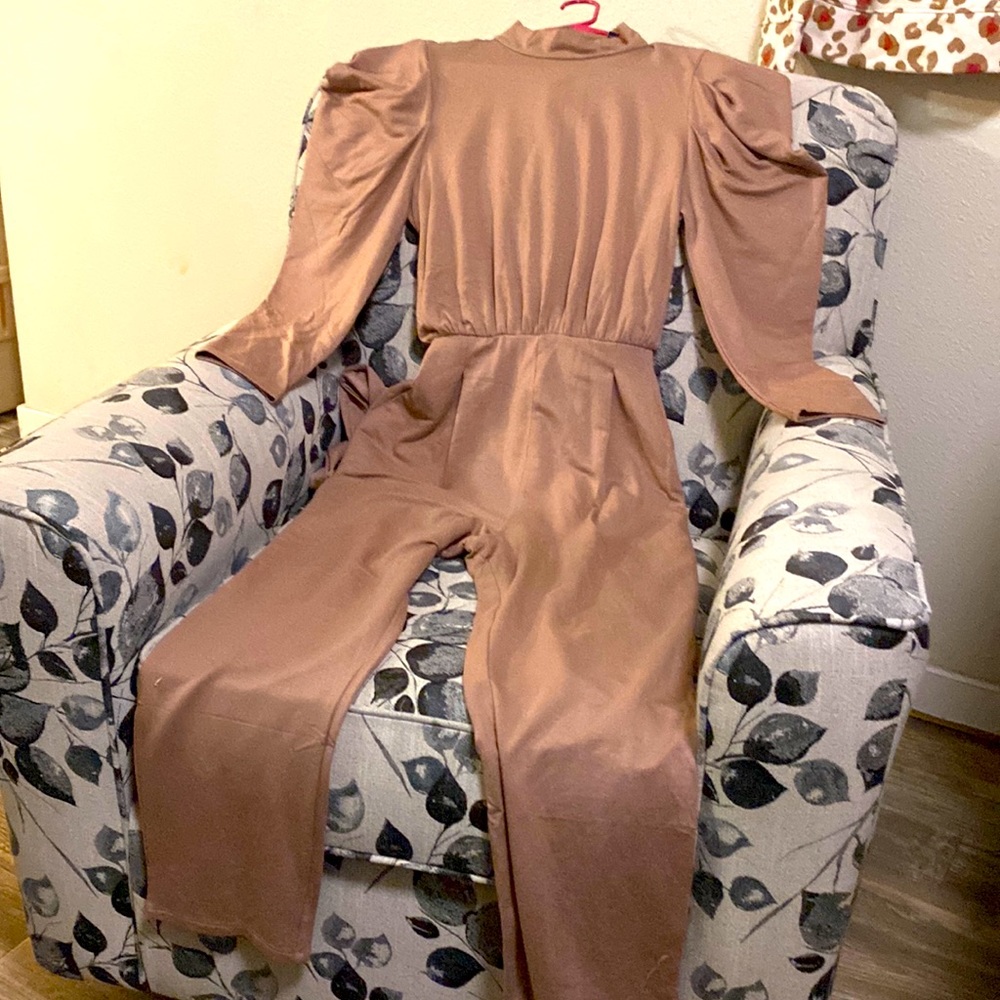 Beautiful jumpsuit, Color is like a tan/beige, New with tags